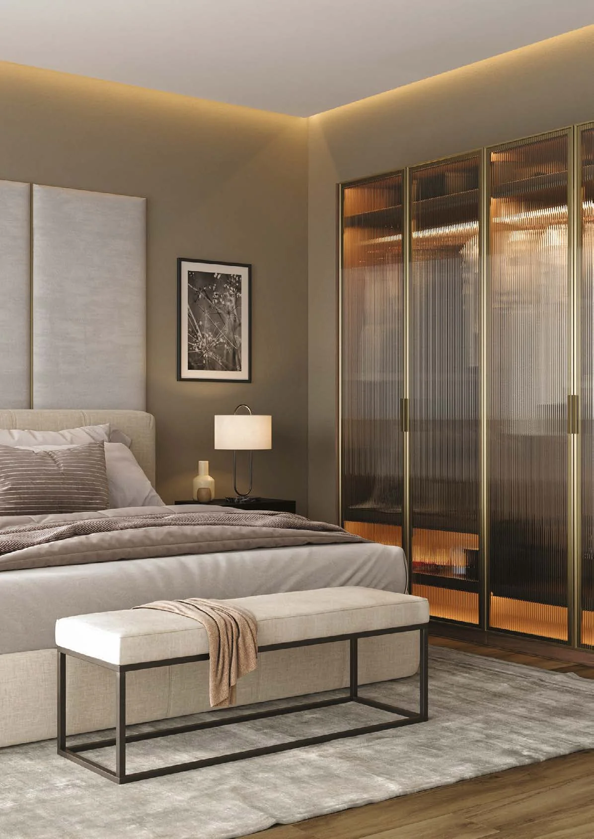 Brass-framed Vitro glass wardrobe doors in a bedroom